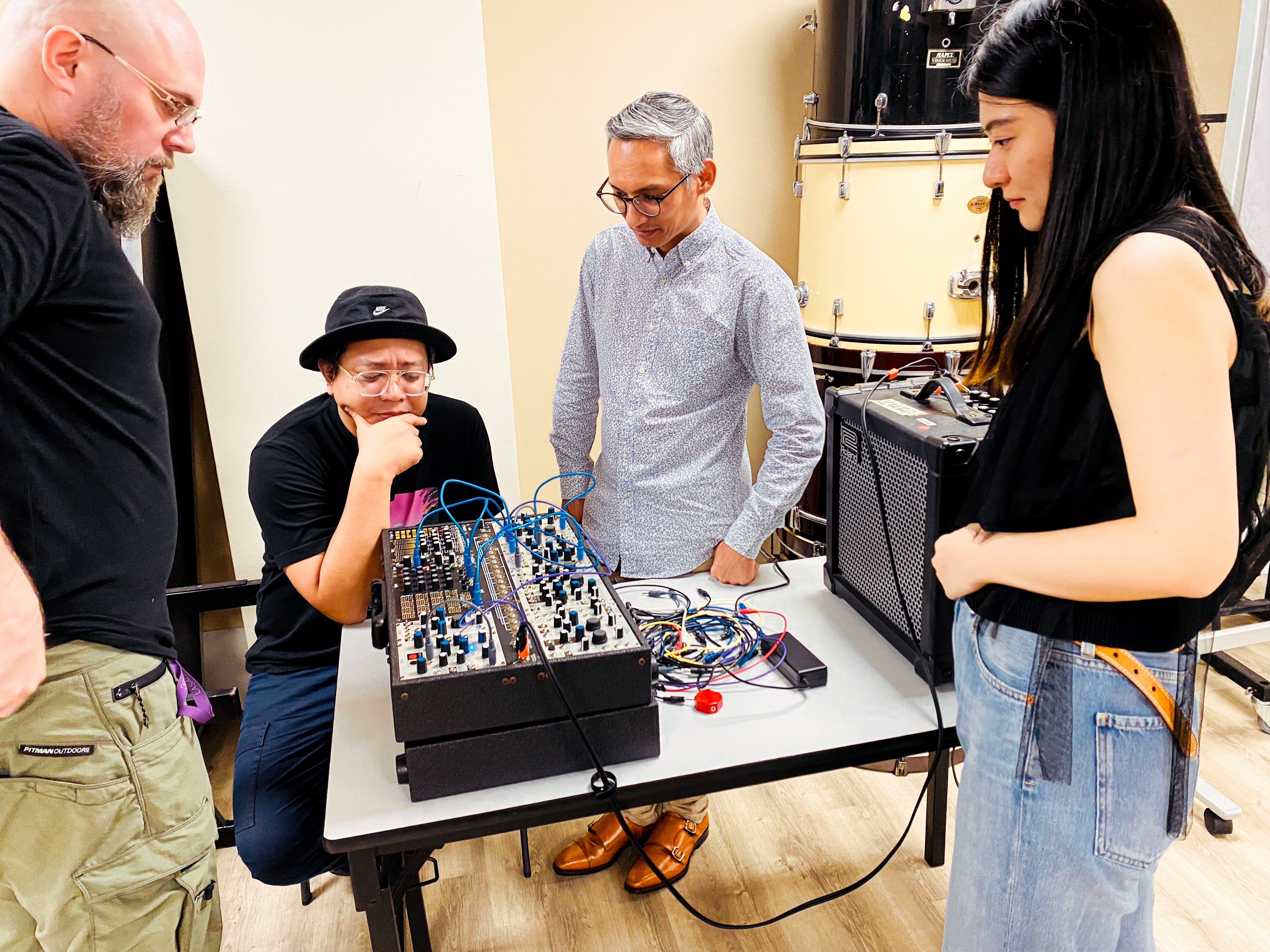 LASALLE MA Arts Pedagogy and Practice students experimenting with synths during a class.