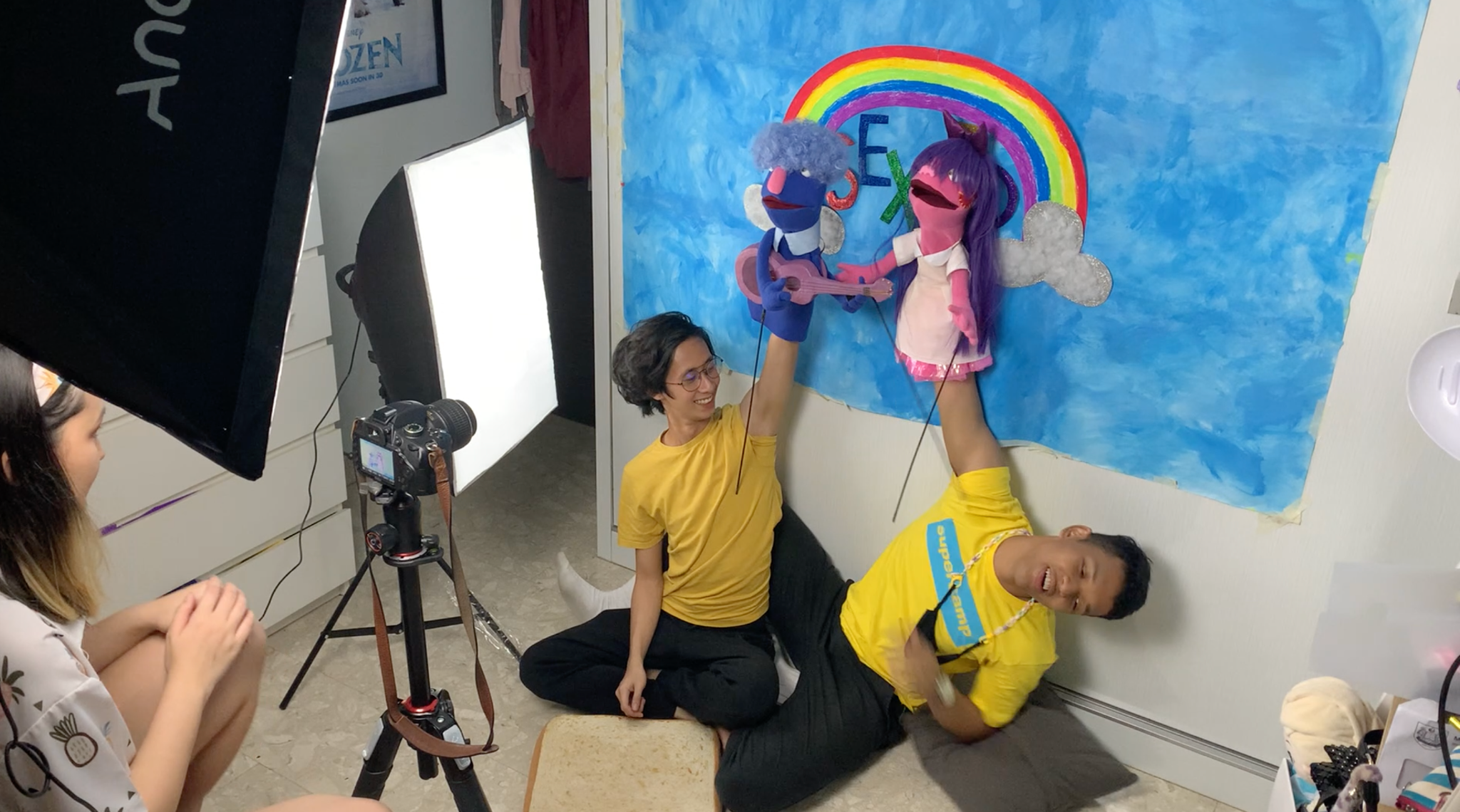 Puppeteers Matthias Teh En and Irsyad Dawood act out an educational video by Ministry of Educating in a sequence highly reminiscent of webseries Don’t Hug Me I’m Scared.