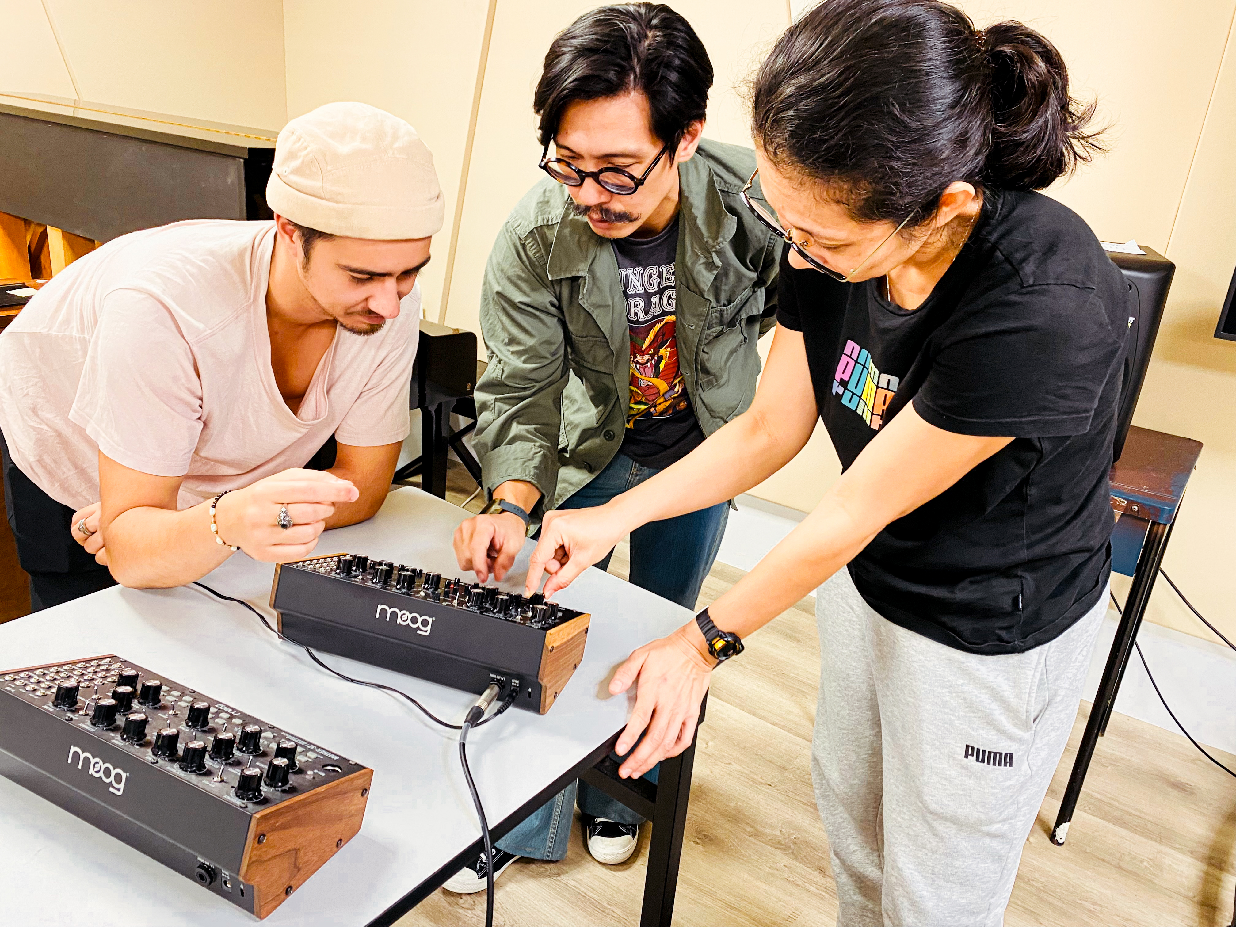 LASALLE MA Arts Pedagogy and Practice students experimenting with synths during a class.
