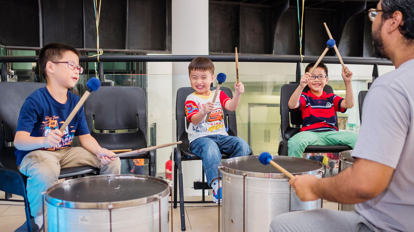 Kids playing drums