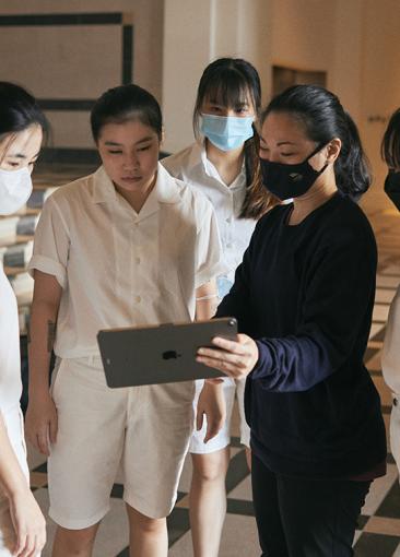 Choreographer Dapheny Chen monitors a performance with students at the National Gallery Singapore.