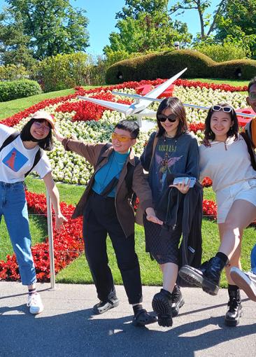 BA(Hons) Animation Art students strike a pose in front of the Geneva Flower Clock during their trip to Annecy, France. 