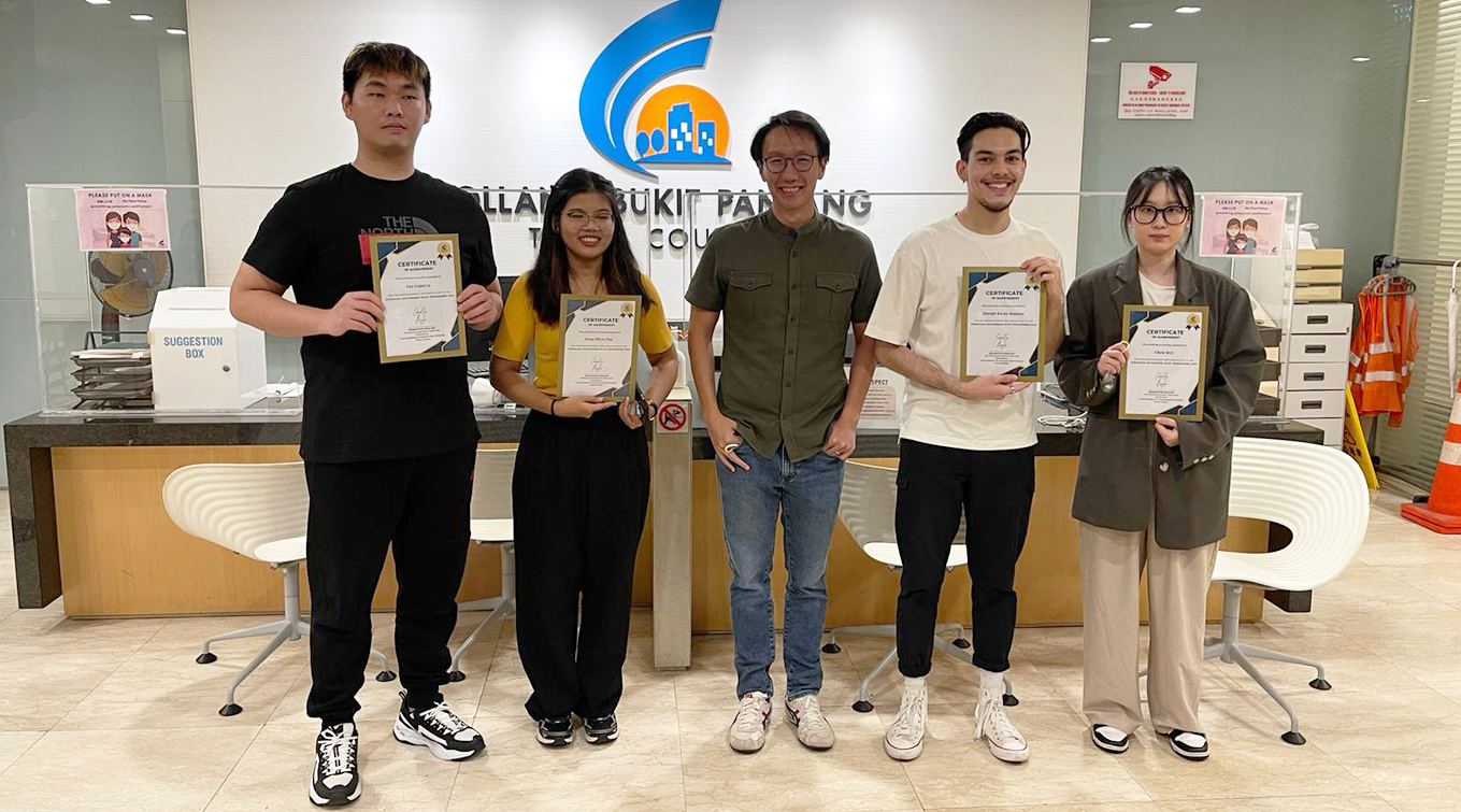 Member of Parliament Edward Chia (centre) with Diploma in Interior Design students (from left) Lin Guanyu, Pyae Phyo Thu, Joseph Kiran Hanson and Chen Siyi
