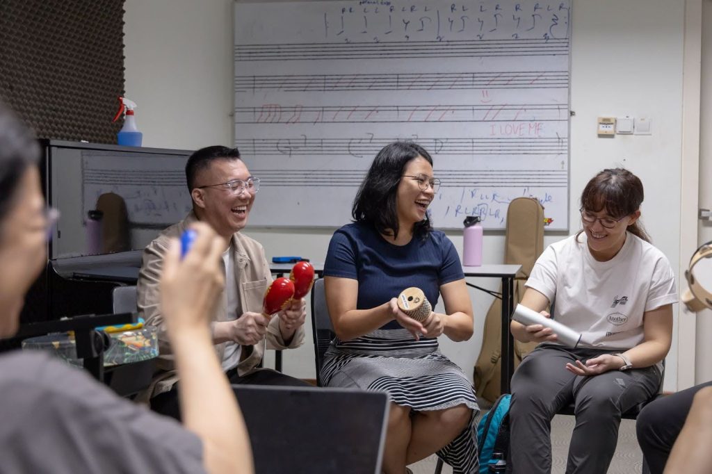 MA Music Therapy Programme Leader Dr Indra (foreground on the right) teaching a class at LASALLE.