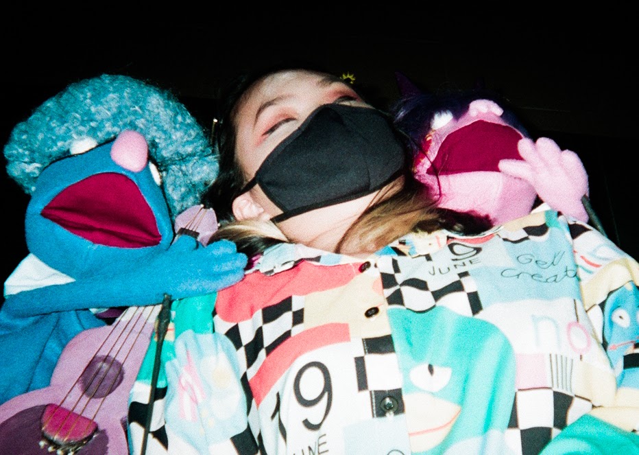 Calleen after a tiring day on set with the puppets featured in Act 2.