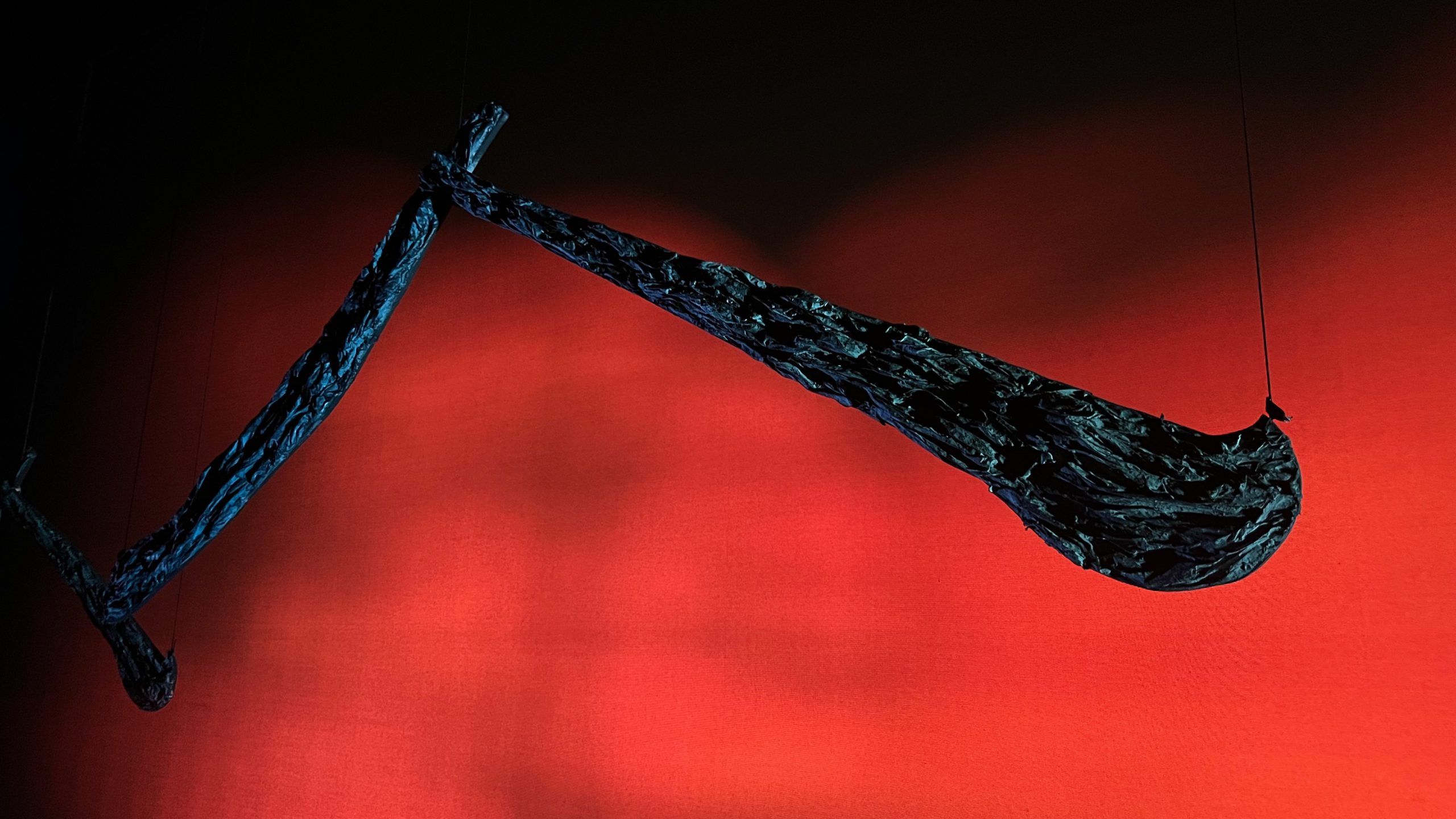 The large rén characters that are suspended above the set. Photo by Jacy Teo.