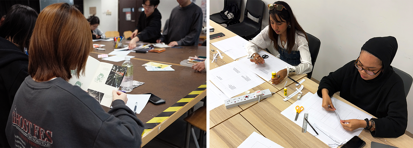 Students seated at large workshop desks, working on making their zines.