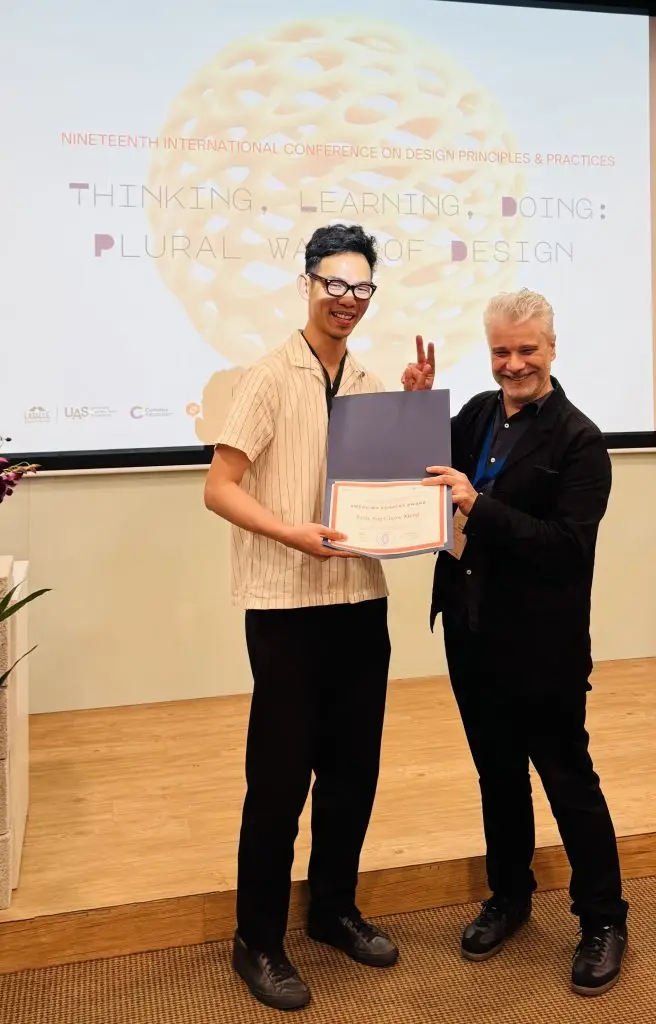 Felix Sng (left) with Cumulus President Lorenzo Imbesi at The 19th International Conference on Design Principles and Practices. Felix, Darius and Sheng Jin were all named Emerging Scholars.